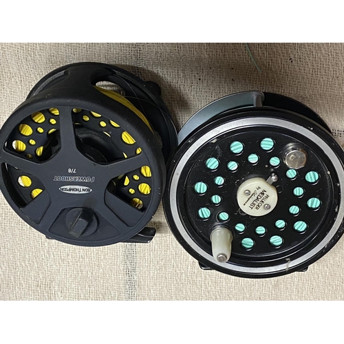 54 - A Shakespear fixed spool  fishing reel and a Ron Thompson fixed spool fishing reel.