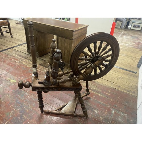 428 - A large and well made vintage spinning wheel. 104cm tall x 100cm long.  shipping unavailable