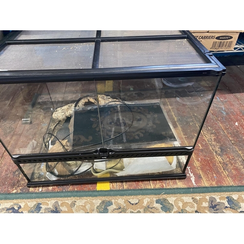 111A - A reptile tank complete with accessories and heat pad 61x48cm, shipping unavailable