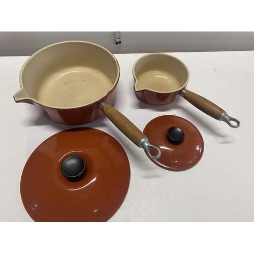 13 - Two Le Creuset sauce pans