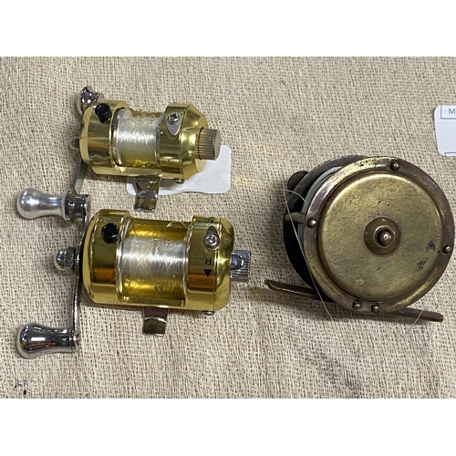 352 - Three small brass poachers fishing reels