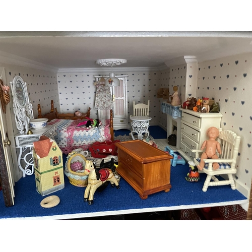 1 - A large vintage dolls house. complete with furniture for each room. 87x95x44cm .Shipping unavailable