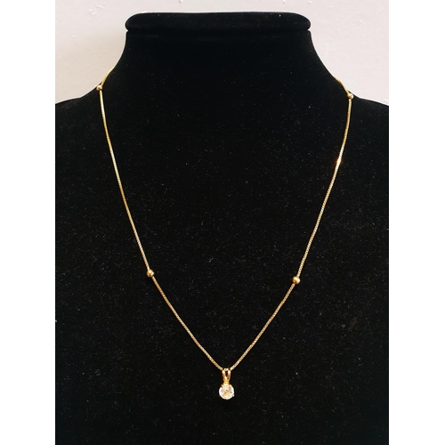 104 - A 9ct Gold chain and pendant. 2.64g