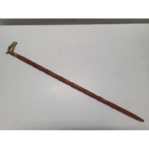 360 - A brass topped walking cane. Shipping unavailable