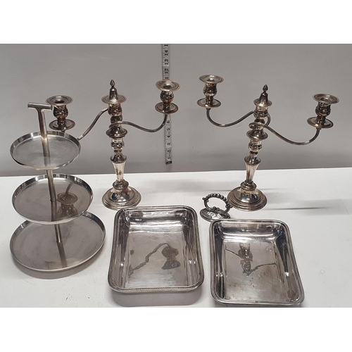 383 - A selection of silver plated wares including candelabras and cake stands. Shipping unavailable