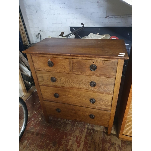 50 - An antique oak five chest of drawers complete with key measuring 91x48x107. shipping unavailable