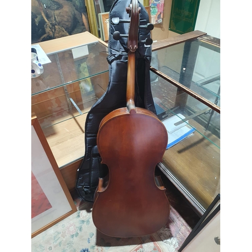 73 - A cased Cello with bow. Shipping unavailable