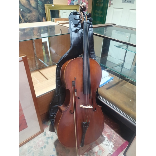 73 - A cased Cello with bow. Shipping unavailable