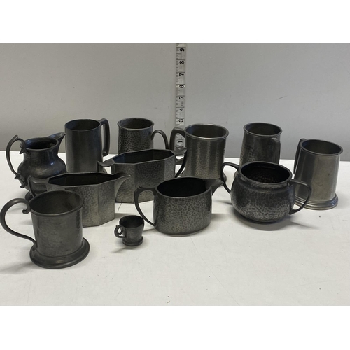 12 - A selection pewter tankards, milk jugs etc