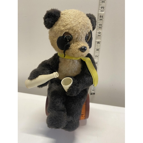 31 - A vintage mechanical drinking panda