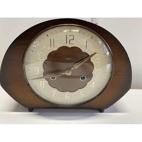 52 - A vintage Smiths mantel clock with key.Shipping unavailable