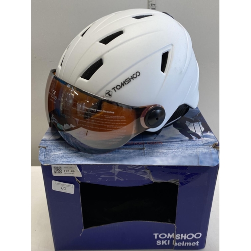 81 - A boxed Tomshoo ski helmet.Shipping unavailable