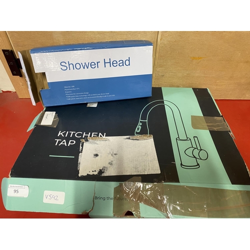 95 - A boxed Kitchen tap and shower head (unchecked)