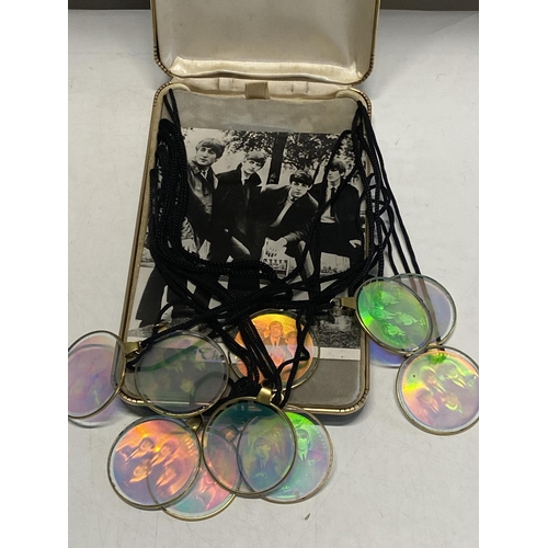 198 - Ten vintage Beatles hologram pendants