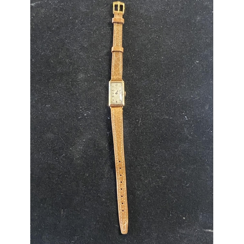 123 - A ladies Art deco period 9ct gold bodied Dennison case watch