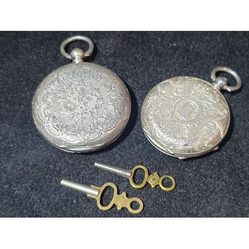 110 - Two antique continental silver ladies pocket watches both with keys and in working order