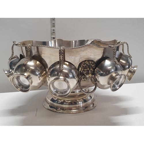 51 - A good quality silver plated punch bowl with six goblets and ladle, does have dedication to side, sh... 