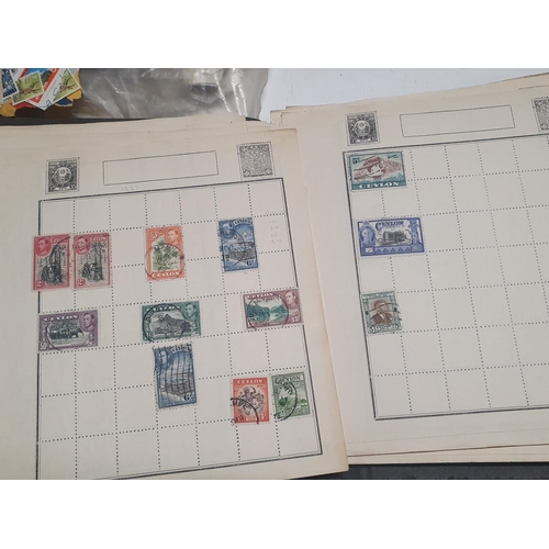 8 - A selection of world stamps and assorted stamp albums