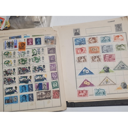 8 - A selection of world stamps and assorted stamp albums