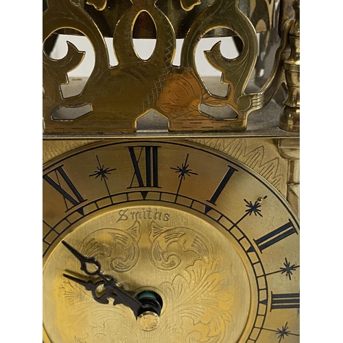 210 - A brass cased lantern clock made by Smiths (battery operated, working), h24cm, shipping unavailable
... 