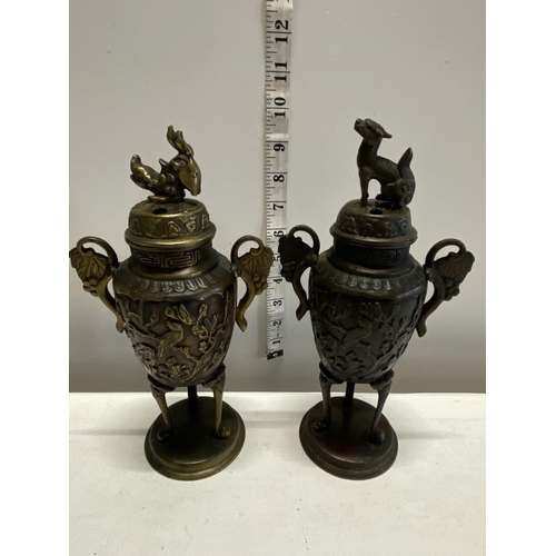 140 - A pair of Chinese antique bronze censors both fou dog motif to top in good condition, h24cm