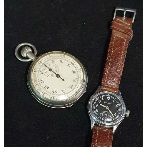 124 - A vintage military Air Ministry WW2 stop watch and a Bulova wrist watch (needs attention)