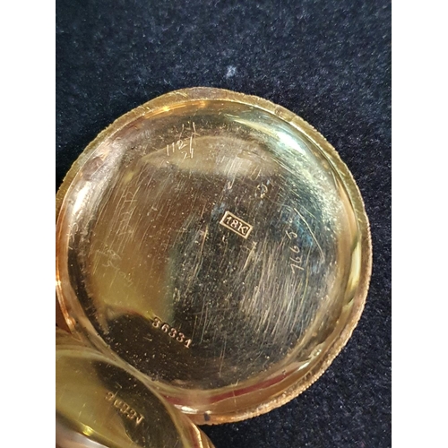 129 - A 18ct gold mid size open face pocket watch in working order (stamped 18ct to outer case and inner c... 