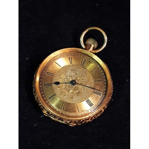 129 - A 18ct gold mid size open face pocket watch in working order (stamped 18ct to outer case and inner c... 