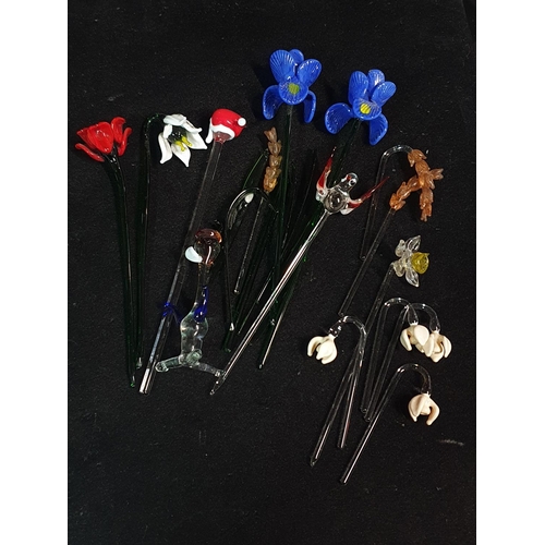 131 - A selection of Murano glass flowers and animals etc