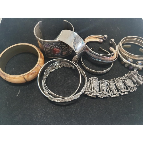 161 - A job lot of assorted bangles including some stamped 925