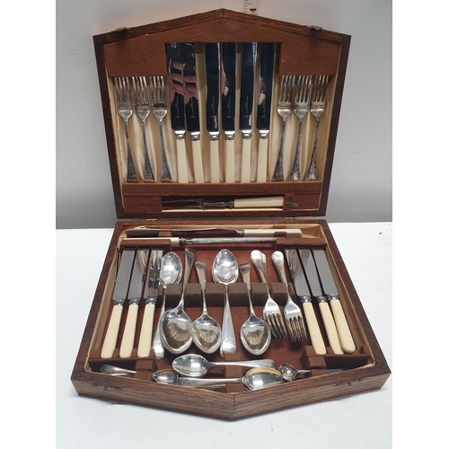 164 - A oak cased cutlery box and contents of Sheffield plate cutlery