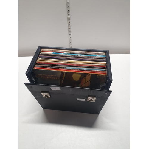 206 - A vintage LP record case and contents of mixed genre LP records including David Bowie, Beatles etc