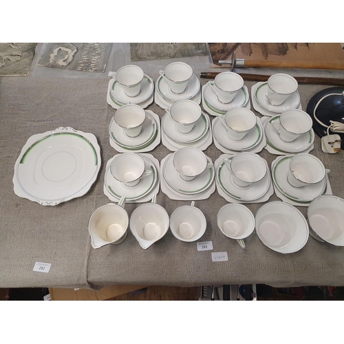 283 - A large Art Deco Style Bell china tea service 43 pieces, shipping unavailable