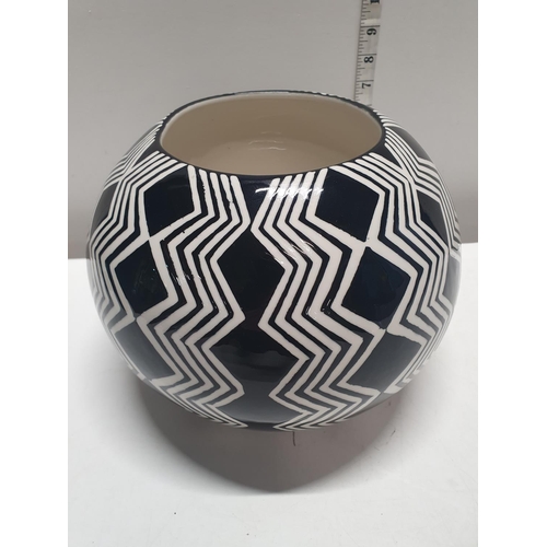 38 - A large Art Pottery black and white bowl stamped TS to base,  h20cm, shipping unavailable