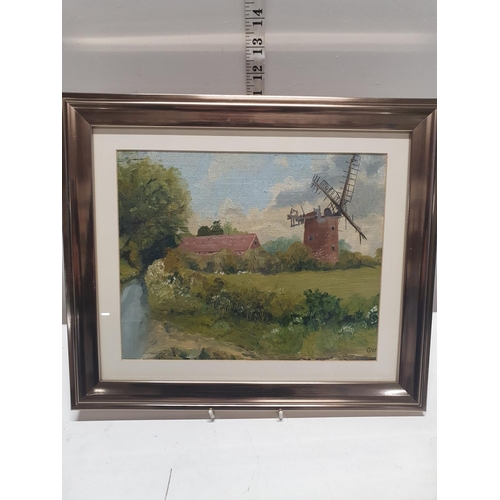 48 - A early framed oil painting by Geoffrey Woolsey Birks 1929 - 1993 depicting a windmill and farm scen... 