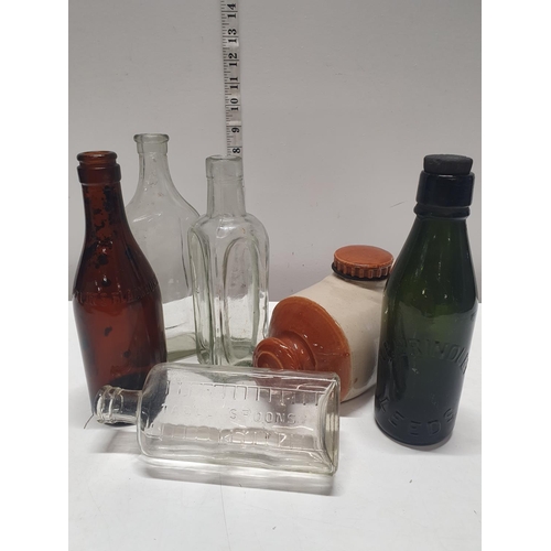52 - A selection of antique/vintage bottles and a salt glazed hot water bottle, shipping unavailable