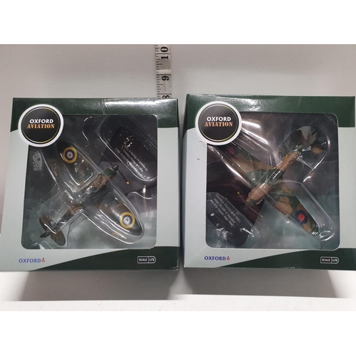 56 - Two boxed Oxford die-cast military plane models