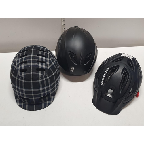 71 - Three assorted safety helmets, shipping unavailable