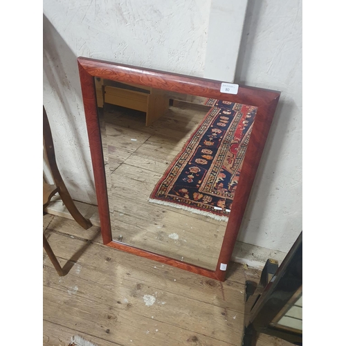 80 - A wooden framed mirror with bevelled edge glass, 76x50cm, shipping unavailable