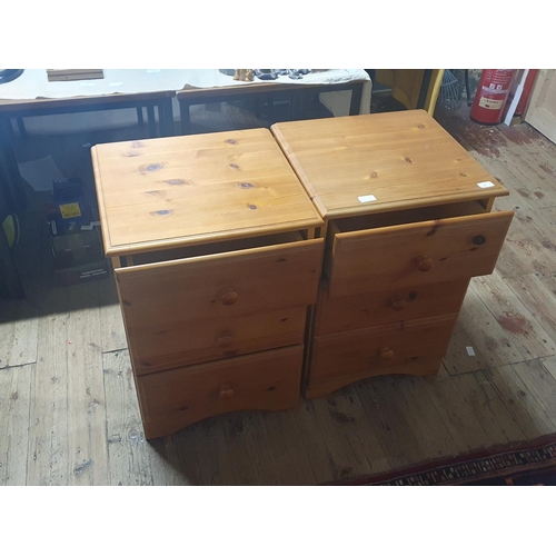 85 - A pair of pine three drawer bedside cabinets, shipping unavailable