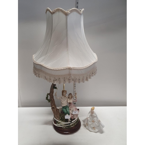 98 - A large figural lamp base and a porcelain figurine, shipping unavailable