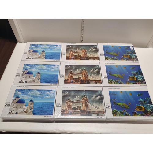 70 - Nine 1000 piece wooden puzzles, three different themes