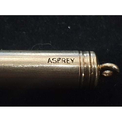 128 - A hallmarked 9ct gold propelling pencil stamped ASPREY (6.44g) and a yellow metal pendant