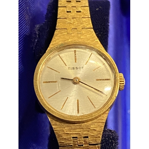 159 - A late 1970's ladies Tissot wrist watch with paperwork (ticking when tested)