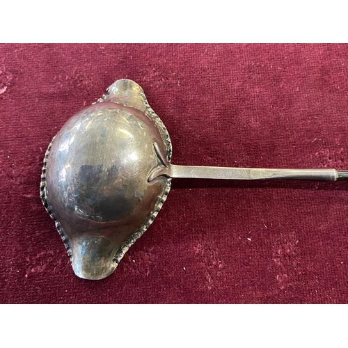 182 - A antique provincial silver toddy ladle with twisted horn handle