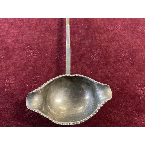 182 - A antique provincial silver toddy ladle with twisted horn handle