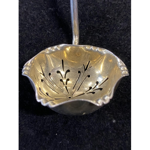 211 - A hallmarked for Sheffield 1911 silver straining ladle with gilt bowl 24g