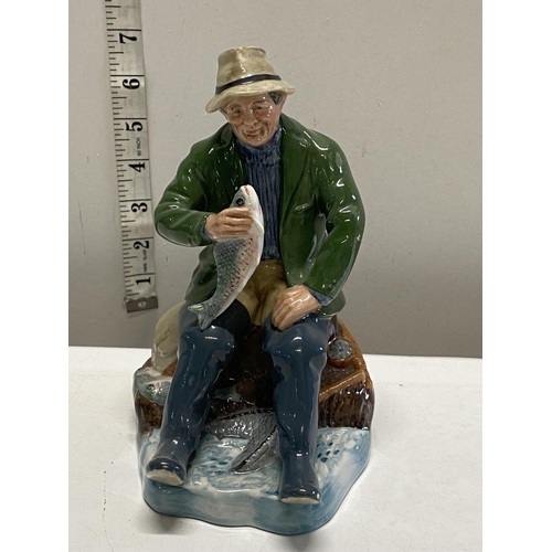 188 - A Royal Doulton figurine 'A Good Catch' HN2258