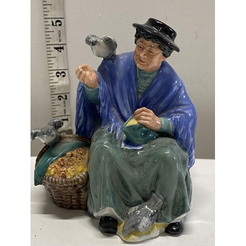 191 - A Royal Doulton figurine 'Tuppence a Bag' HN2320