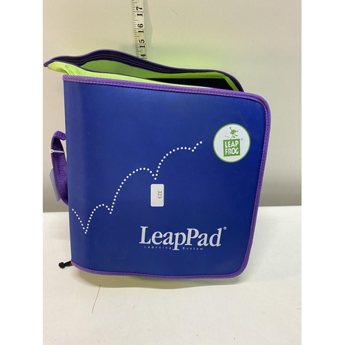 323 - A child's leap pad and other items (untested)